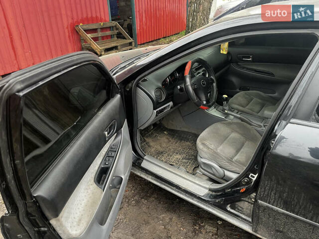 Черный Мазда 6, объемом двигателя 2 л и пробегом 300 тыс. км за 3000 $, фото 3 на Automoto.ua