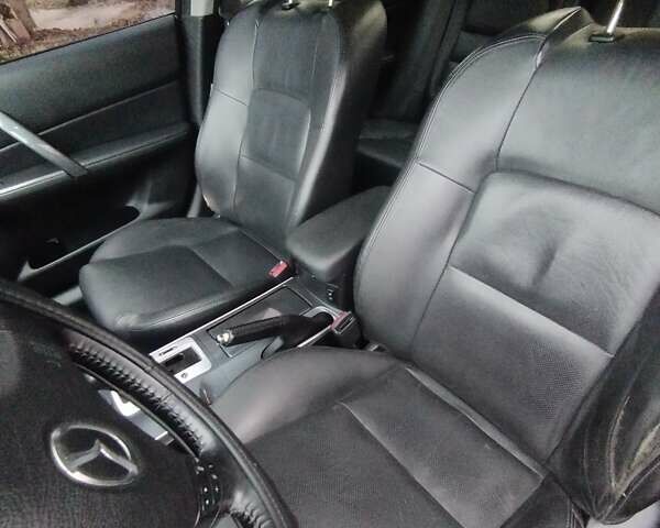 Черный Мазда 6, объемом двигателя 2 л и пробегом 185 тыс. км за 5000 $, фото 13 на Automoto.ua