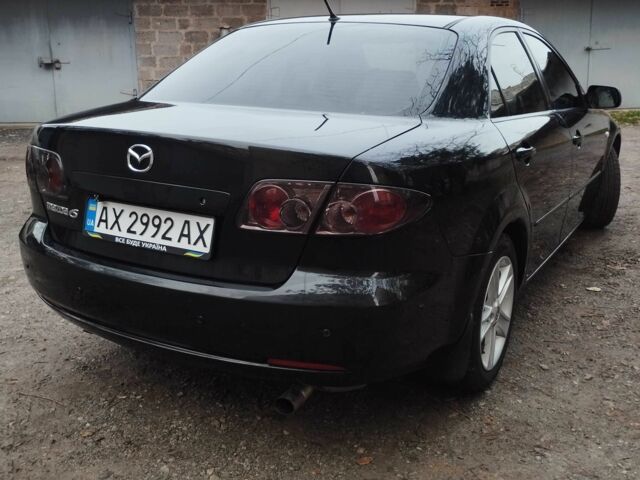 Черный Мазда 6, объемом двигателя 2 л и пробегом 185 тыс. км за 5000 $, фото 5 на Automoto.ua