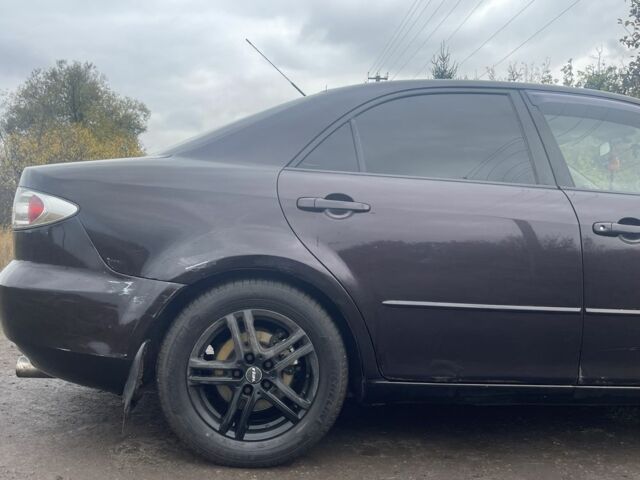 Чорний Мазда 6, об'ємом двигуна 2 л та пробігом 252 тис. км за 3800 $, фото 4 на Automoto.ua