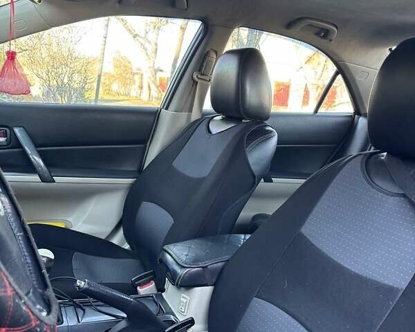 Черный Мазда 6, объемом двигателя 1.8 л и пробегом 301 тыс. км за 3800 $, фото 10 на Automoto.ua