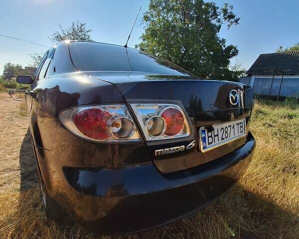 Черный Мазда 6, объемом двигателя 2 л и пробегом 218 тыс. км за 5000 $, фото 7 на Automoto.ua