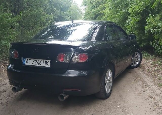 Черный Мазда 6, объемом двигателя 2.3 л и пробегом 270 тыс. км за 5837 $, фото 14 на Automoto.ua