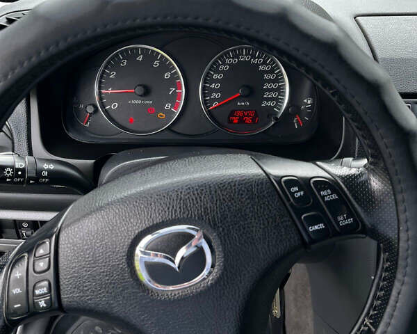 Черный Мазда 6, объемом двигателя 1.8 л и пробегом 210 тыс. км за 4500 $, фото 8 на Automoto.ua