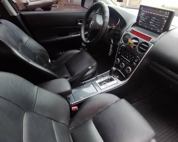 Черный Мазда 6, объемом двигателя 2 л и пробегом 185 тыс. км за 5000 $, фото 17 на Automoto.ua