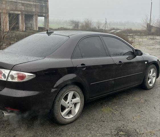 Черный Мазда 6, объемом двигателя 2 л и пробегом 185 тыс. км за 4100 $, фото 2 на Automoto.ua