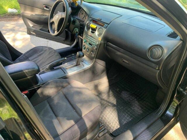 Черный Мазда 6, объемом двигателя 2 л и пробегом 399 тыс. км за 2700 $, фото 15 на Automoto.ua