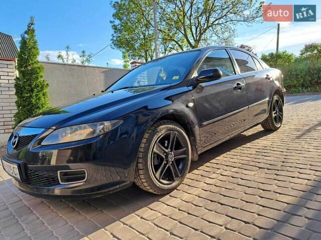 Черный Мазда 6, объемом двигателя 1.8 л и пробегом 234 тыс. км за 5000 $, фото 4 на Automoto.ua