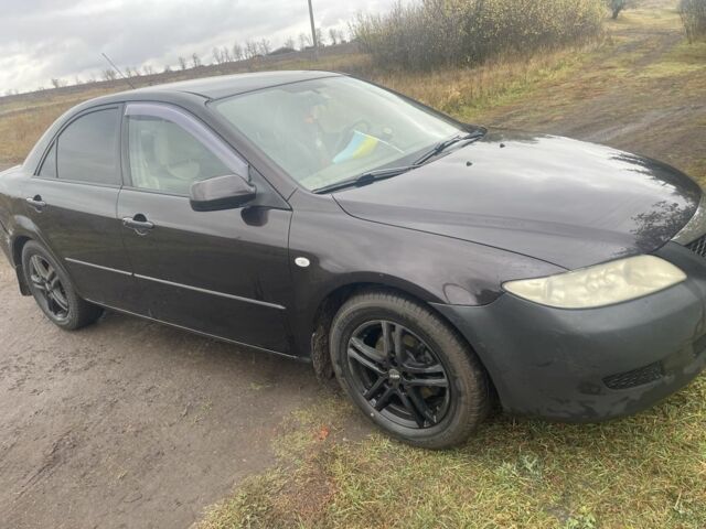 Чорний Мазда 6, об'ємом двигуна 2 л та пробігом 252 тис. км за 3800 $, фото 2 на Automoto.ua