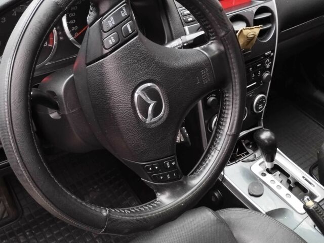 Черный Мазда 6, объемом двигателя 2 л и пробегом 185 тыс. км за 5000 $, фото 18 на Automoto.ua