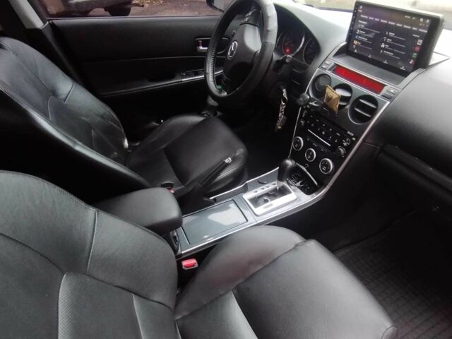 Черный Мазда 6, объемом двигателя 2 л и пробегом 185 тыс. км за 5000 $, фото 17 на Automoto.ua