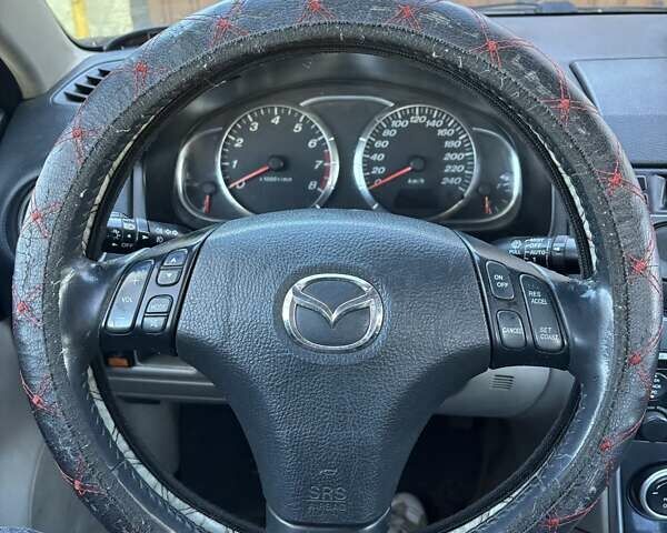 Черный Мазда 6, объемом двигателя 1.8 л и пробегом 301 тыс. км за 3800 $, фото 8 на Automoto.ua