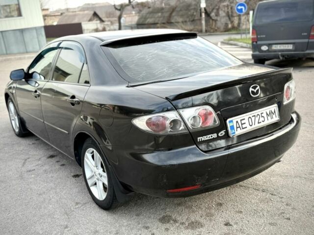 Черный Мазда 6, объемом двигателя 2 л и пробегом 190 тыс. км за 3950 $, фото 4 на Automoto.ua
