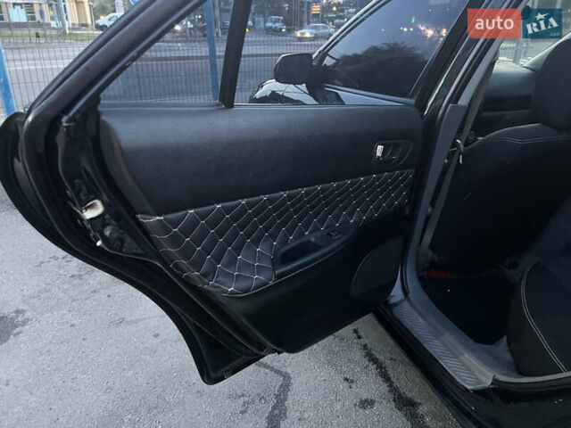 Черный Мазда 6, объемом двигателя 2 л и пробегом 333 тыс. км за 4500 $, фото 11 на Automoto.ua