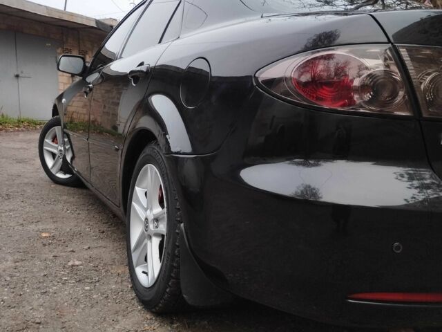 Черный Мазда 6, объемом двигателя 2 л и пробегом 185 тыс. км за 5000 $, фото 4 на Automoto.ua