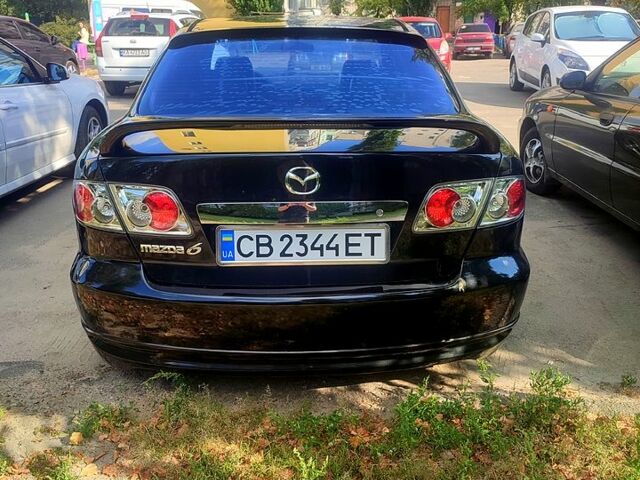 Черный Мазда 6, объемом двигателя 2 л и пробегом 203 тыс. км за 5300 $, фото 2 на Automoto.ua