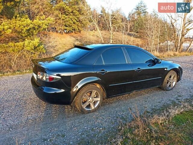 Черный Мазда 6, объемом двигателя 1.8 л и пробегом 200 тыс. км за 4700 $, фото 3 на Automoto.ua