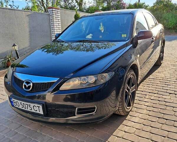 Черный Мазда 6, объемом двигателя 1.8 л и пробегом 234 тыс. км за 5000 $, фото 1 на Automoto.ua
