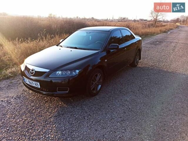 Черный Мазда 6, объемом двигателя 1.8 л и пробегом 200 тыс. км за 4700 $, фото 1 на Automoto.ua