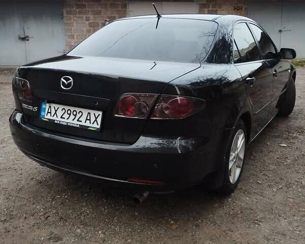 Черный Мазда 6, объемом двигателя 2 л и пробегом 185 тыс. км за 5000 $, фото 7 на Automoto.ua