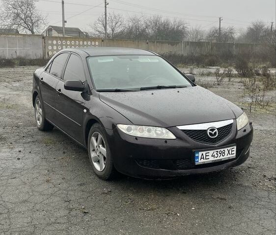 Черный Мазда 6, объемом двигателя 2 л и пробегом 185 тыс. км за 4100 $, фото 1 на Automoto.ua