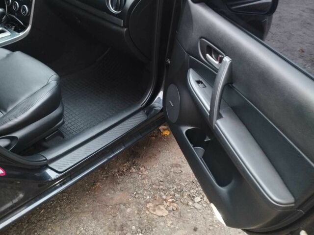 Черный Мазда 6, объемом двигателя 2 л и пробегом 185 тыс. км за 5000 $, фото 19 на Automoto.ua