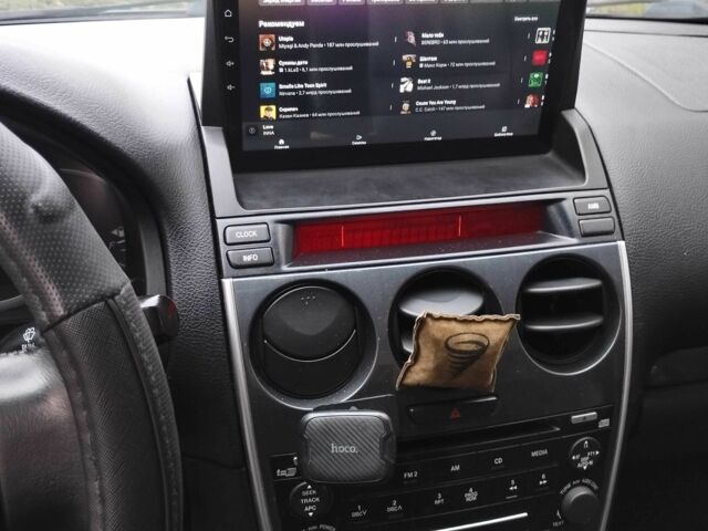 Черный Мазда 6, объемом двигателя 2 л и пробегом 185 тыс. км за 5000 $, фото 12 на Automoto.ua