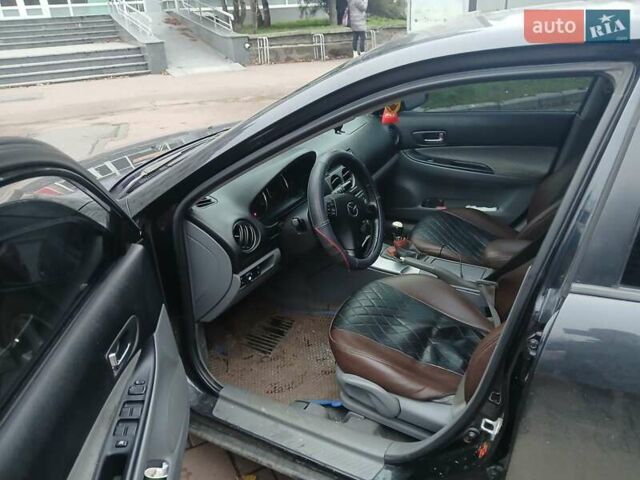 Чорний Мазда 6, об'ємом двигуна 1.8 л та пробігом 305 тис. км за 5000 $, фото 9 на Automoto.ua