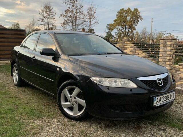 Черный Мазда 6, объемом двигателя 2 л и пробегом 202 тыс. км за 4700 $, фото 1 на Automoto.ua