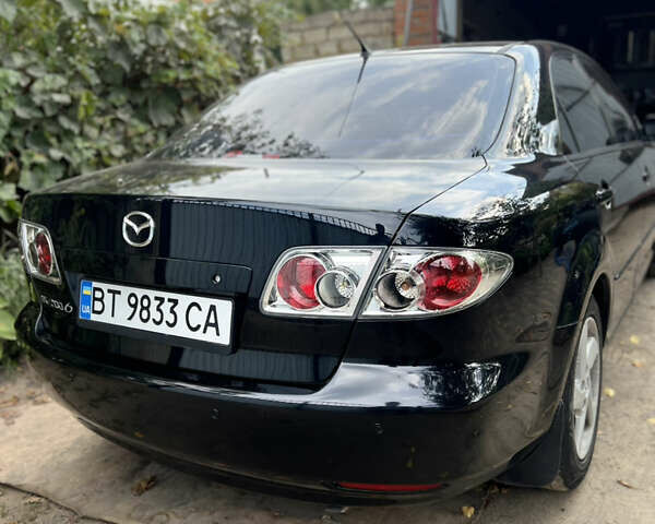 Черный Мазда 6, объемом двигателя 2 л и пробегом 333 тыс. км за 4500 $, фото 6 на Automoto.ua