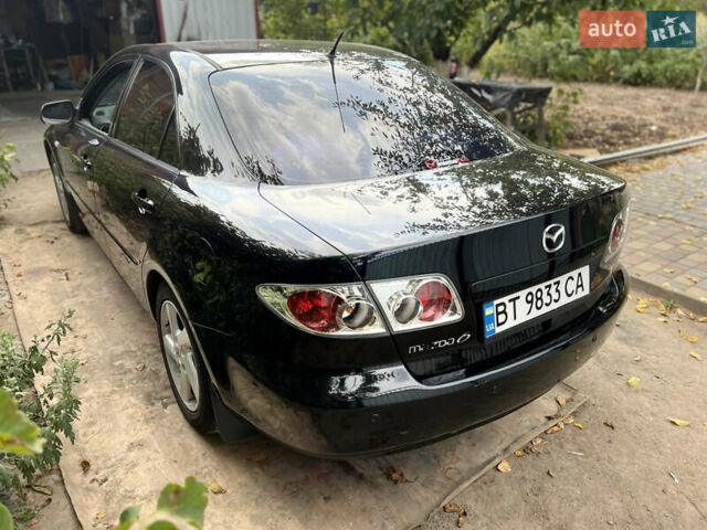 Черный Мазда 6, объемом двигателя 2 л и пробегом 333 тыс. км за 4500 $, фото 5 на Automoto.ua