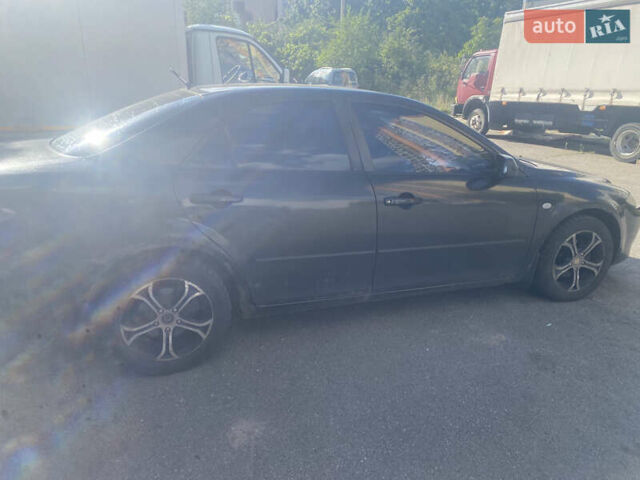 Черный Мазда 6, объемом двигателя 2 л и пробегом 320 тыс. км за 2800 $, фото 5 на Automoto.ua