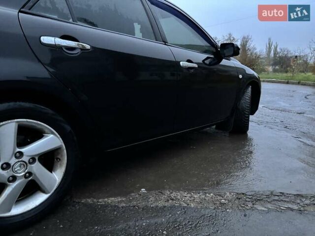 Черный Мазда 6, объемом двигателя 1.8 л и пробегом 301 тыс. км за 3800 $, фото 2 на Automoto.ua