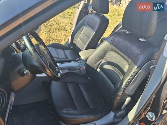 Черный Мазда 6, объемом двигателя 2 л и пробегом 218 тыс. км за 5000 $, фото 11 на Automoto.ua