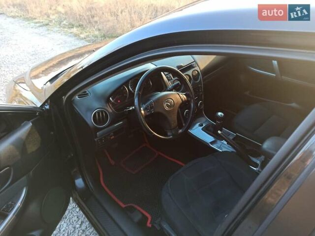 Черный Мазда 6, объемом двигателя 1.8 л и пробегом 200 тыс. км за 4700 $, фото 6 на Automoto.ua