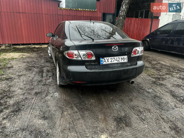 Черный Мазда 6, объемом двигателя 2 л и пробегом 300 тыс. км за 3000 $, фото 2 на Automoto.ua