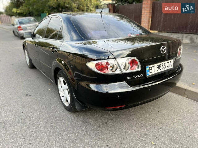 Черный Мазда 6, объемом двигателя 2 л и пробегом 333 тыс. км за 4500 $, фото 4 на Automoto.ua