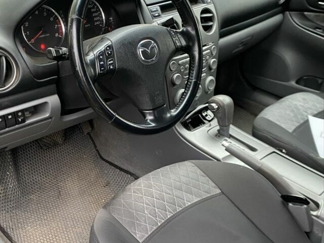 Черный Мазда 6, объемом двигателя 2 л и пробегом 257 тыс. км за 5500 $, фото 2 на Automoto.ua