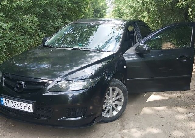 Черный Мазда 6, объемом двигателя 2.3 л и пробегом 270 тыс. км за 5837 $, фото 17 на Automoto.ua