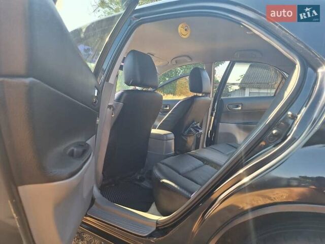 Черный Мазда 6, объемом двигателя 2 л и пробегом 218 тыс. км за 5000 $, фото 4 на Automoto.ua
