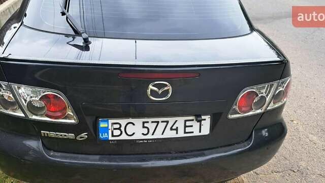 Чорний Мазда 6, об'ємом двигуна 2 л та пробігом 200 тис. км за 3300 $, фото 5 на Automoto.ua