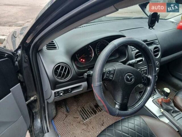 Чорний Мазда 6, об'ємом двигуна 1.8 л та пробігом 305 тис. км за 5000 $, фото 1 на Automoto.ua