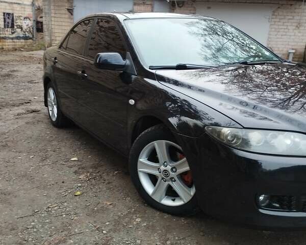 Черный Мазда 6, объемом двигателя 2 л и пробегом 185 тыс. км за 5000 $, фото 2 на Automoto.ua