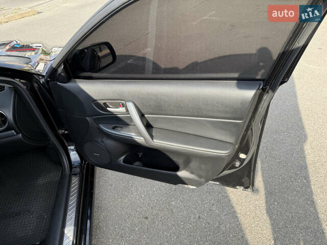 Чорний Мазда 6, об'ємом двигуна 2.26 л та пробігом 255 тис. км за 5700 $, фото 30 на Automoto.ua