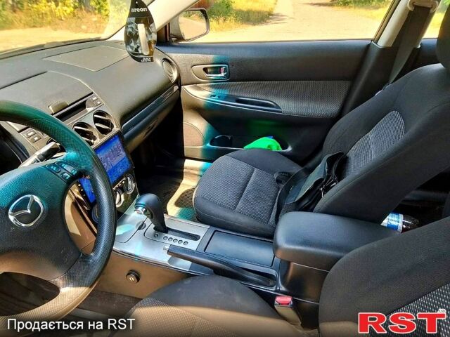 Черный Мазда 6, объемом двигателя 2 л и пробегом 270 тыс. км за 2900 $, фото 4 на Automoto.ua