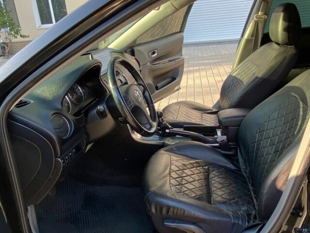 Черный Мазда 6, объемом двигателя 1.8 л и пробегом 235 тыс. км за 3700 $, фото 3 на Automoto.ua