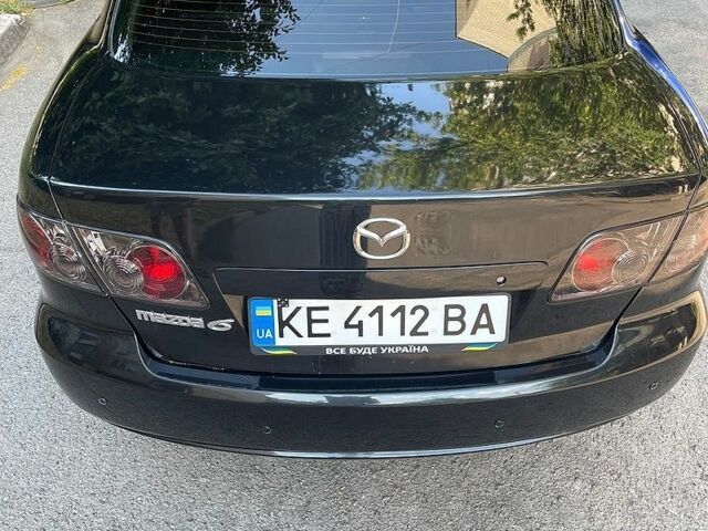 Черный Мазда 6, объемом двигателя 2 л и пробегом 196 тыс. км за 4400 $, фото 2 на Automoto.ua