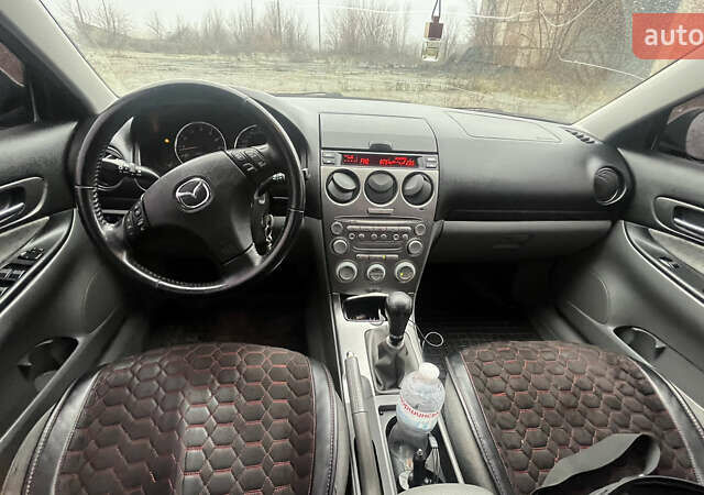 Чорний Мазда 6, об'ємом двигуна 2 л та пробігом 185 тис. км за 4111 $, фото 6 на Automoto.ua