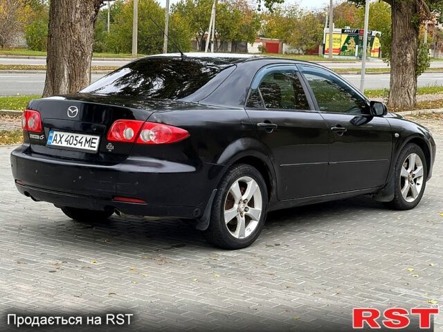 Черный Мазда 6, объемом двигателя 2.3 л и пробегом 250 тыс. км за 3300 $, фото 2 на Automoto.ua