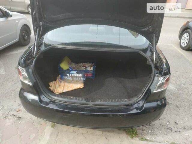 Черный Мазда 6, объемом двигателя 1.8 л и пробегом 250 тыс. км за 4200 $, фото 1 на Automoto.ua